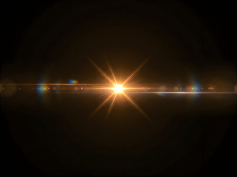 Abstract golden light flare effect with horizontal streaks isolated on a dark black background for design overlays