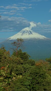Hike, iztaccihuatl volcano, popocatepetl volcano,puebla,mexico popocatepetl volcano erupting smoke and ash in mexico
