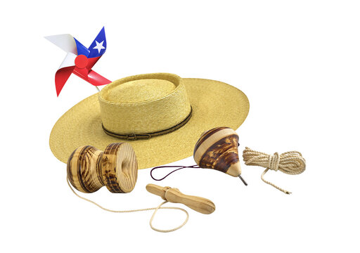 Celebrating chilean national holidays with traditional toys and a straw hat on transparent background