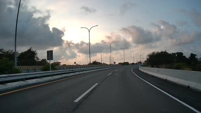 Rear Dashcam View Under Dramatic Cloudy Morning Sky Near Juanda Toll Road East Java Indonesia