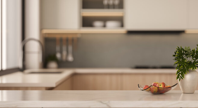 Marble kitchen island tabletop with bowl of apples close up