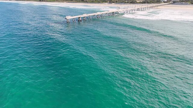 Aerial View of Ocean Waves and Pier at Surfers Paradise