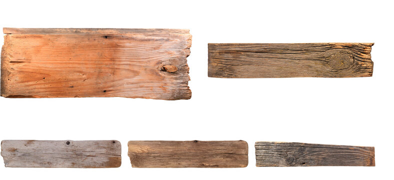Assortment of old weathered wooden planks with natural texture and distinct grain patterns.