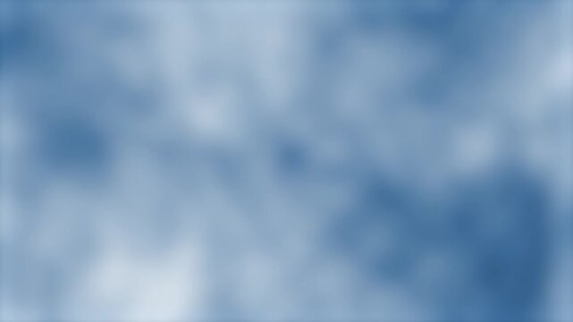 Soft blue clouds swirling gently in atmospheric motion during a tranquil dawn sky