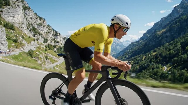 Cyclist Racing Down Mountain Pass Peloton in Background