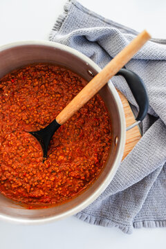 homemade vegetarian lentil bolognese sauce in big pot on kitchen counter