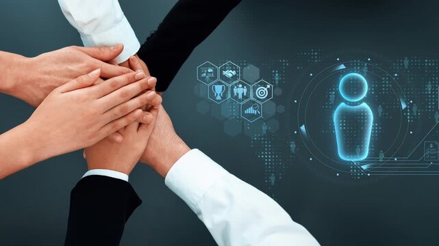 Hands from diverse individuals stacked together highlight teamwork and collaboration, set against a modern digital backdrop showcasing unity and innovation. Raster