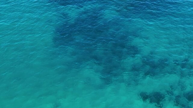 Aerial View of Turquoise Ocean Water and Underwater Reef