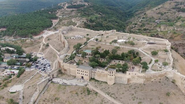 DERBENT, RUSSIA. AUG 15, 2022: Aerial panoramic view of the ancient Naryn-Kala citadel and its massive stone fortress walls in the Republic of Dagestan.