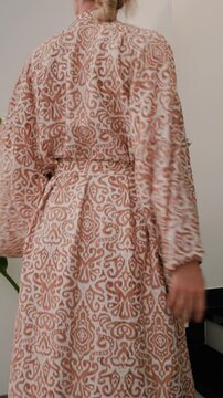 Close up of elegant woman wearing luxury kimono robe.