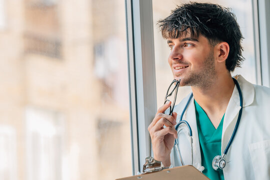smiling young doctor in a clinic or hospital