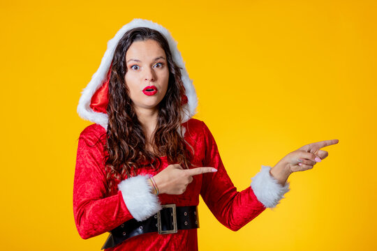 isolated santa claus woman pointing with copy-space