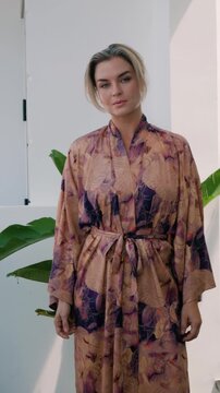 Close up of elegant woman wearing luxury kimono robe.