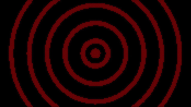 Concentric circles made of red glowing led dot matrix lights on a black background creating a target or ripple effect for digital visual