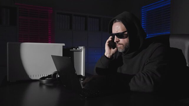 Laptop attack hacker. Hoodie hack hacker. Digital night hacker. Office theft hacker.