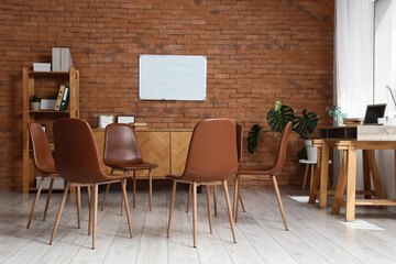 Empty group therapy room with chairs arranged in a circle support group meeting space mental health...