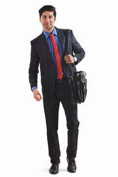 Young businessman holding briefcase