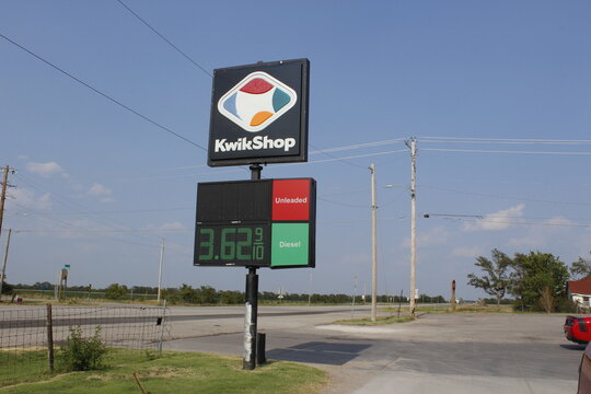 KWIK SHOP Advertisement Sign closeup blue sky 
