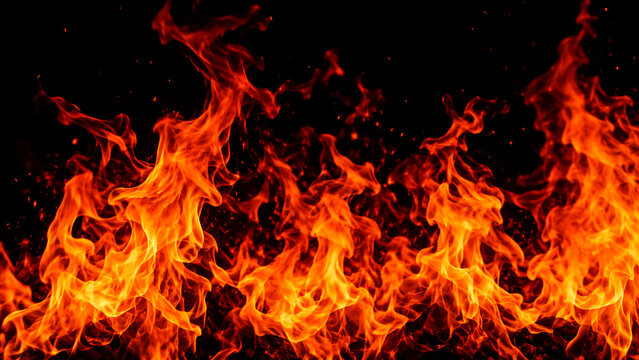 Bright orange and red flames burning against a black background