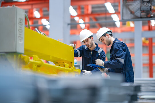 Industrial technicians inspect machine components, evaluate equipment condition, perform preventive maintenance, support quality control, production efficiency, factory operation.