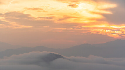 Fototapeta premium Morning sunrise, Blue Sky white Clouds over mountains and mist cover high land, Horizon sky landscape Background at Betong, Yala, Thailand