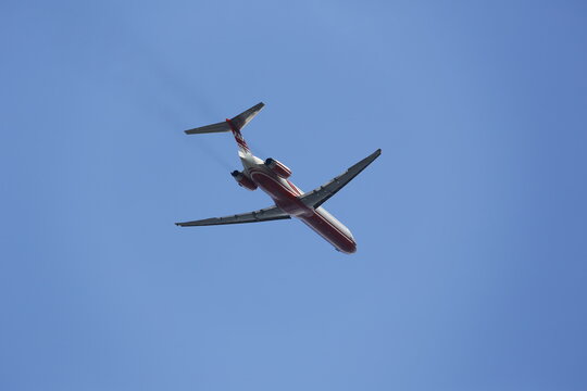 A Far Eastern Air Transport MD-83 Climbs Overhead.