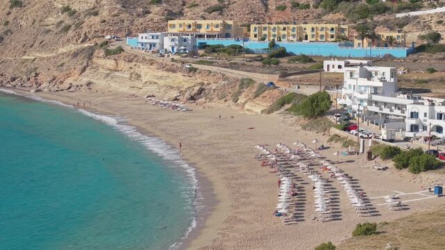 Static drone view capturing the transparent turquoise waters and scenic coastline of Lefkos Beach, highlighting one of Karpathos Island's most beautiful seaside locations.
