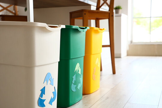 Recycle trash bins in kitchen, closeup