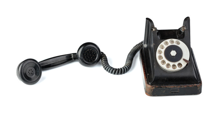 Vintage black phone isolated on a white background.