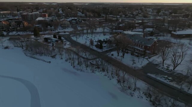 drone flying around one of the historic buildings in chambly quebec canada in winter sunny day