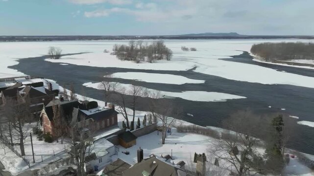 drone overlooking the old town of chambly quebec canada also river richelieau in castle chambly sunnyday