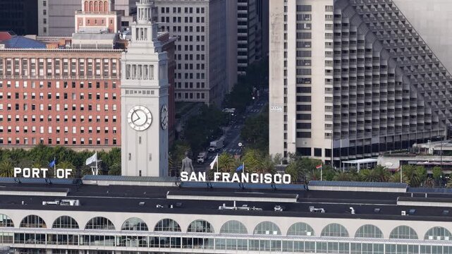 Morning View of Port of San Francisco Ferry Building In Embarcadero, San Francisco, California. drone sideways shot