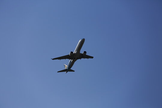 A Mandarin Airlines Embraer E190 Flies Overhead.