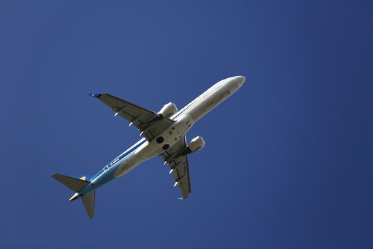 A Mandarin Airlines Embraer E190 Flies Overhead.