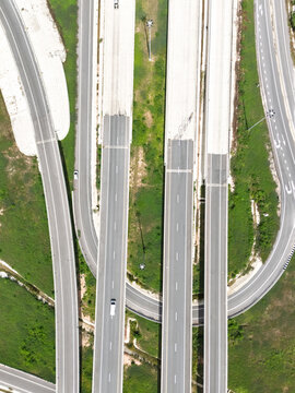 Aerial view of modern highway interchange with overpasses and expressway infrastructure