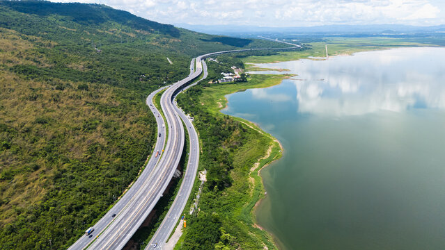 Drone shot The M6 motorway Nakhon Ratchasima Province - Bang Pa-in Lam Ta Khong River and Mountain. Motorway Korat Thailand
