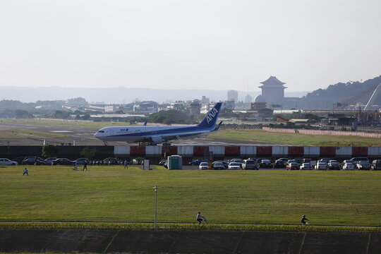 An ANA Boeing 767 Taxis at Songshan Airport.