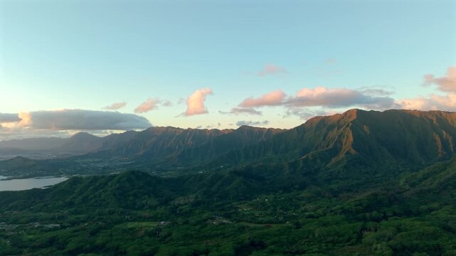 Aerial Sunrise Over Ko'olau Mountain Range and Pacific Ocean Shoreline, Oahu Hawaii