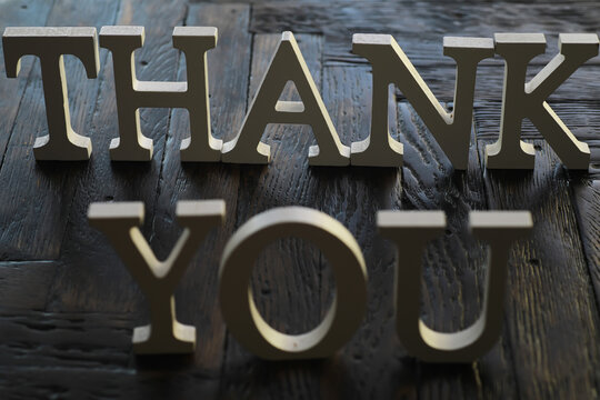 Thank You Letters on Wooden Background - Appreciation and Gratitude Concept