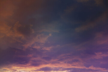 Obraz premium Beautiful sunset sky above clouds with dramatic light. Cabin view from airplane