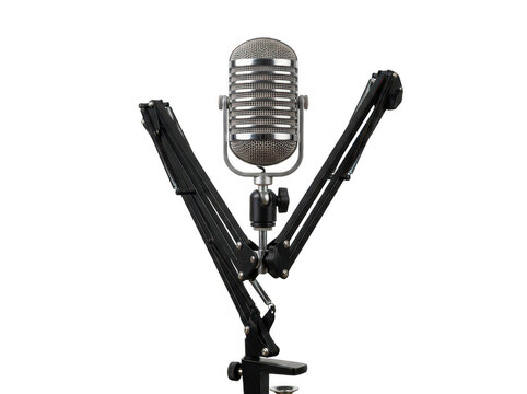 Vintage studio microphone on boom arm. Retro condenser mic for podcasting and recording.
