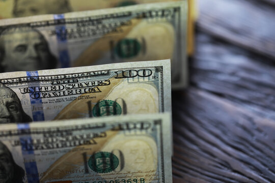Money, US dollar bills background. Money scattered on the desk. Photography for Finance and Economy concepts.