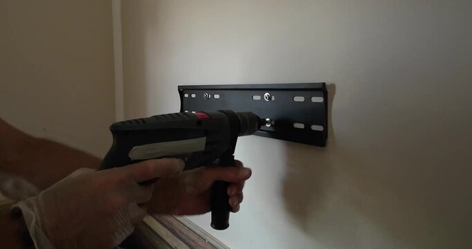 Screwing Wall Bracket with Power Drill and Wall Plugs | DIY 