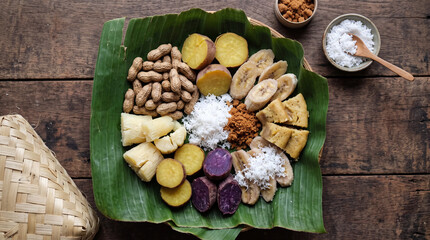 Fototapeta premium Traditional Indonesian Boiled Snacks Platter on Banana Leaf