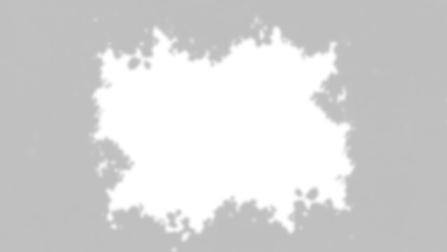 Irregular white shape with blurred edges on transparent background form abstract edge splatter spot patch mark texture design
