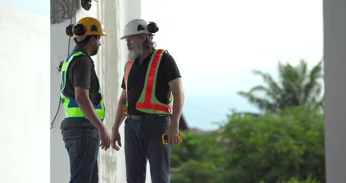  Exhausted construction workers with burnout resting tired and stressed at house building site