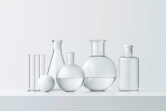 A sterile lab table with test tubes and beakers set up for an experiment, with a clear background and room for text.