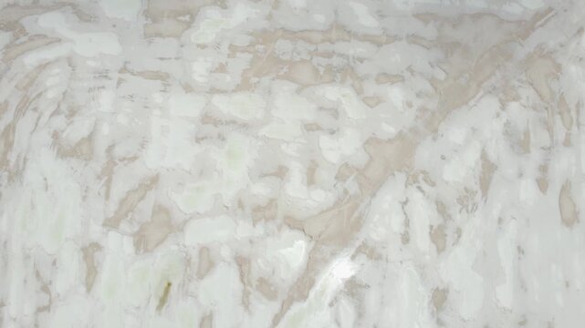 Textured White Salt Crust and Mineral Deposits at Industrial Salt Production Site Australia Aerial Drone Shot
