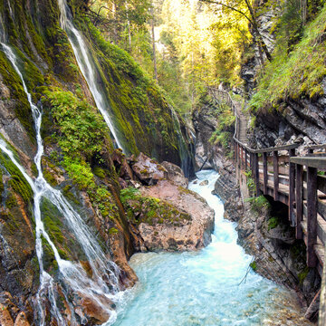Scenic Mountain Gorge with Waterfalls, Wooden Bridge and Crystal Clear Stream