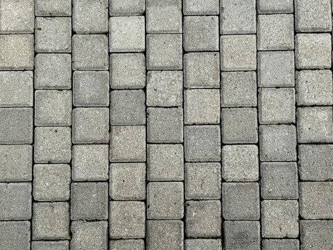 Tiny square stone block paving